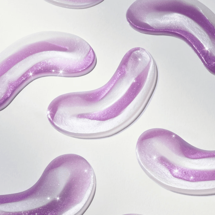 Hydrogel-Augenpatches in lila Farbton von 360° Shot PDRN Glowing Eye Patch, entworfen, um Leuchtkraft, Feuchtigkeit und glattere Haut unter den Augen zu bieten.