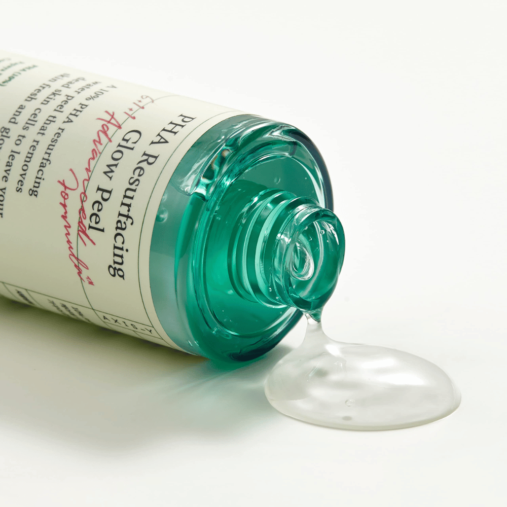 Eine Flasche AXIS - Y PHA Resurfacing Glow Peel 50ml auf einer glatten Oberfläche.