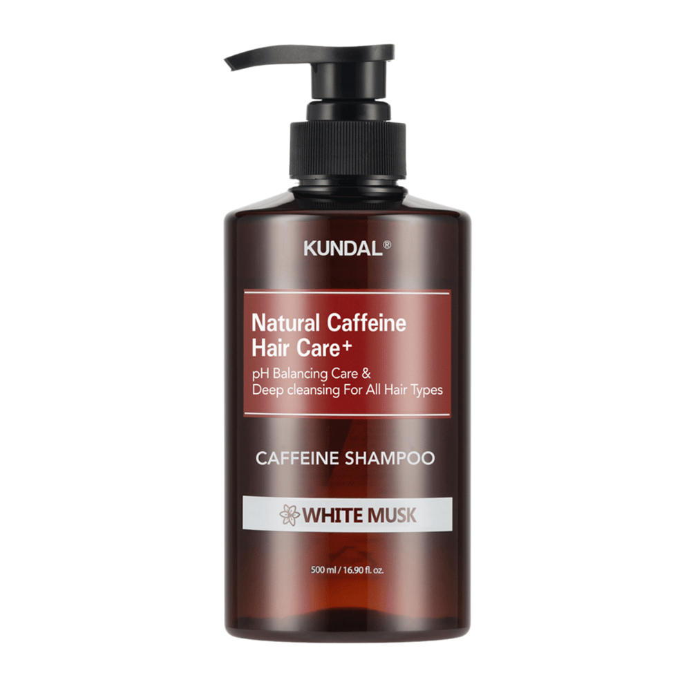 KUNDAL Natural Caffeine Hair Care+ Shampoo White Musk in brauner Plastikflasche mit Pumpe, 500 ml.