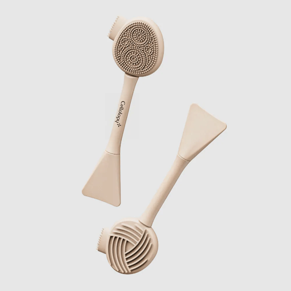 2. Cellolopy Cleaning Brush – Vorder- und Rückseite einer multifunktionalen Reinigungsbürste mit Silikonborsten, geriffelter Oberfläche und Spatel