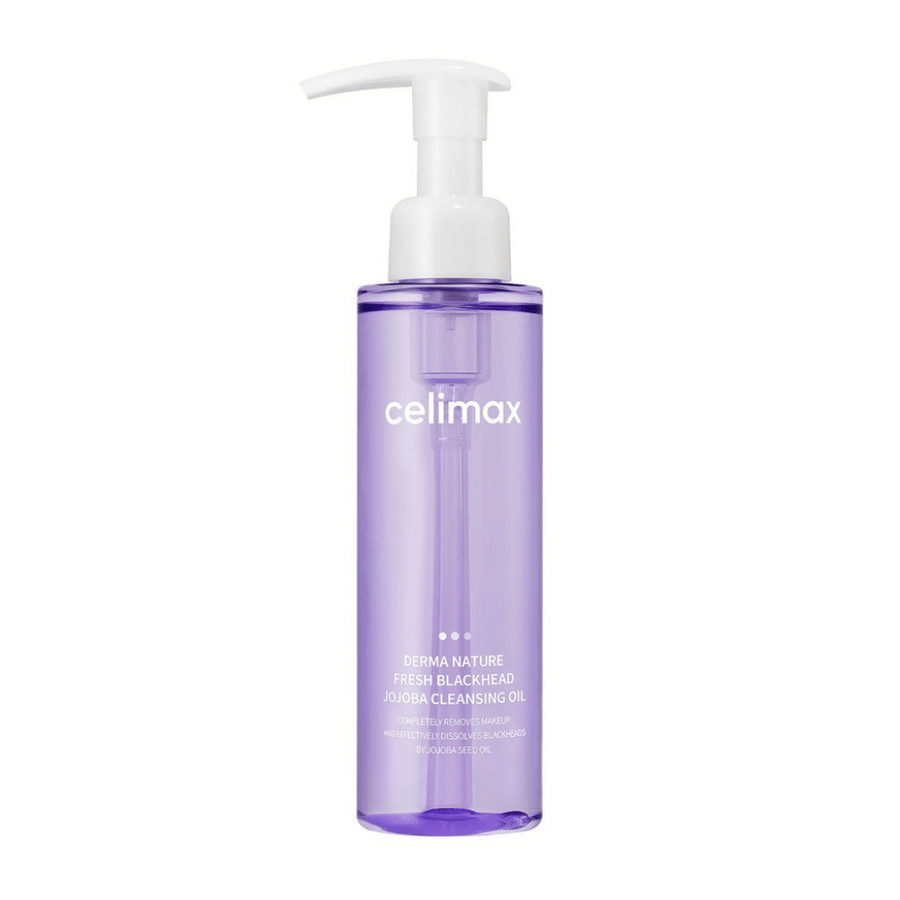 Flaska av Celimax Derma Nature Fresh Blackhead Jojoba Cleansing Oil i genomskinlig lila förpackning med vit pump, mot vit bakgrund.