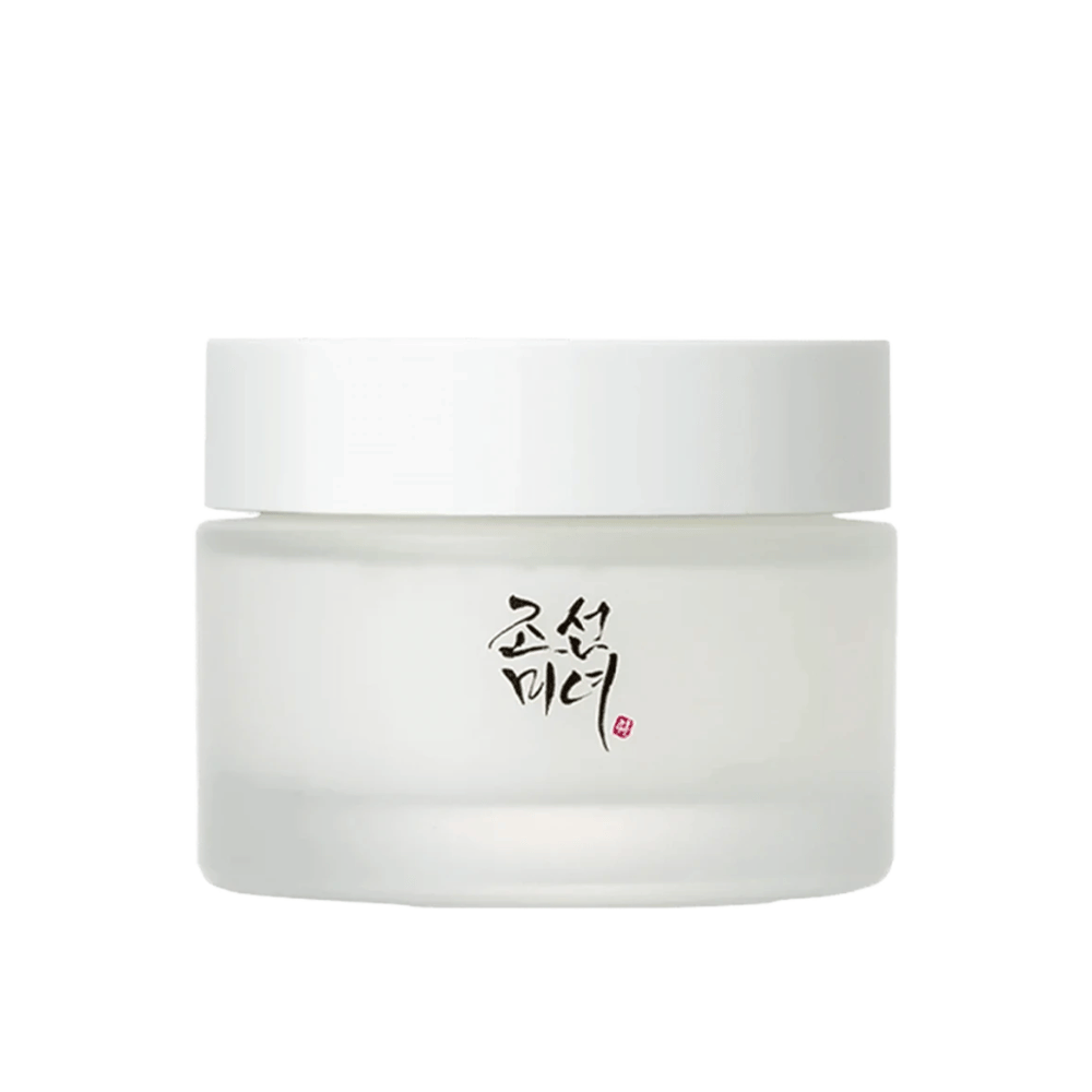 Das Bild zeigt ein Glas "Beauty of Joseon Dynasty Cream". Die Verpackung besteht aus mattiertem Glas mit einem einfachen weißen Deckel, elegant verziert mit traditioneller koreanischer Kalligrafie in Schwarz. Das Produkt soll eine nährstoffreiche Hautpflege bieten, inspiriert von alten koreanischen Schönheitsroutinen.