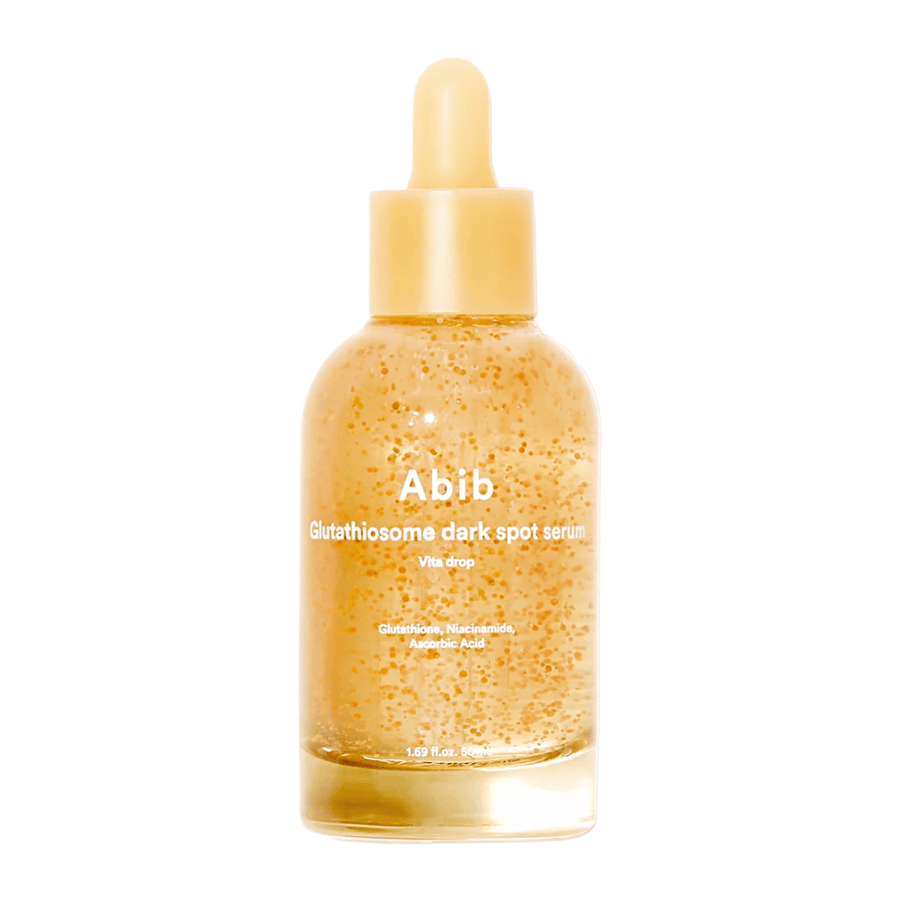 Produktbild av Abib Glutathiosome Dark Spot Serum Vita Drop i en genomskinlig glasflaska med gul pipett och synliga mikrokapslar i serumet.
