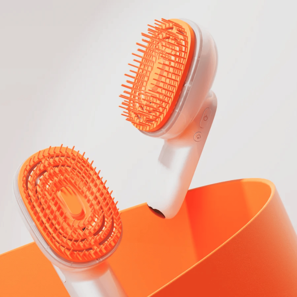 LILYEVE GrowTurn Brush Steam Booster – elektrische Kopfhautbürste mit orangefarbenem Bürstenkopf