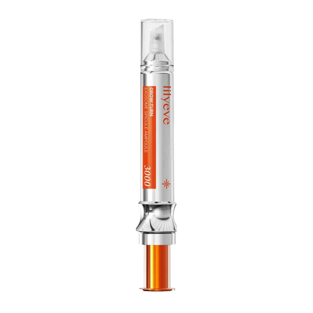 LILYEVE Grow Turn Exosome Spicule Ampoule 3000 – Kopfhautampulle mit Präzisionsapplikator in silber- und orangefarbener Verpackung.