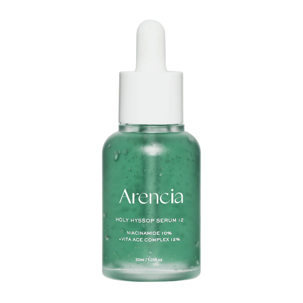 Arencia Holy Hyssop Serum 12 in einer grünen Glasflasche mit Pipette, Gesichtsserum mit 10 % Niacinamid und 12 % Vitamin-ACE-Komplex.