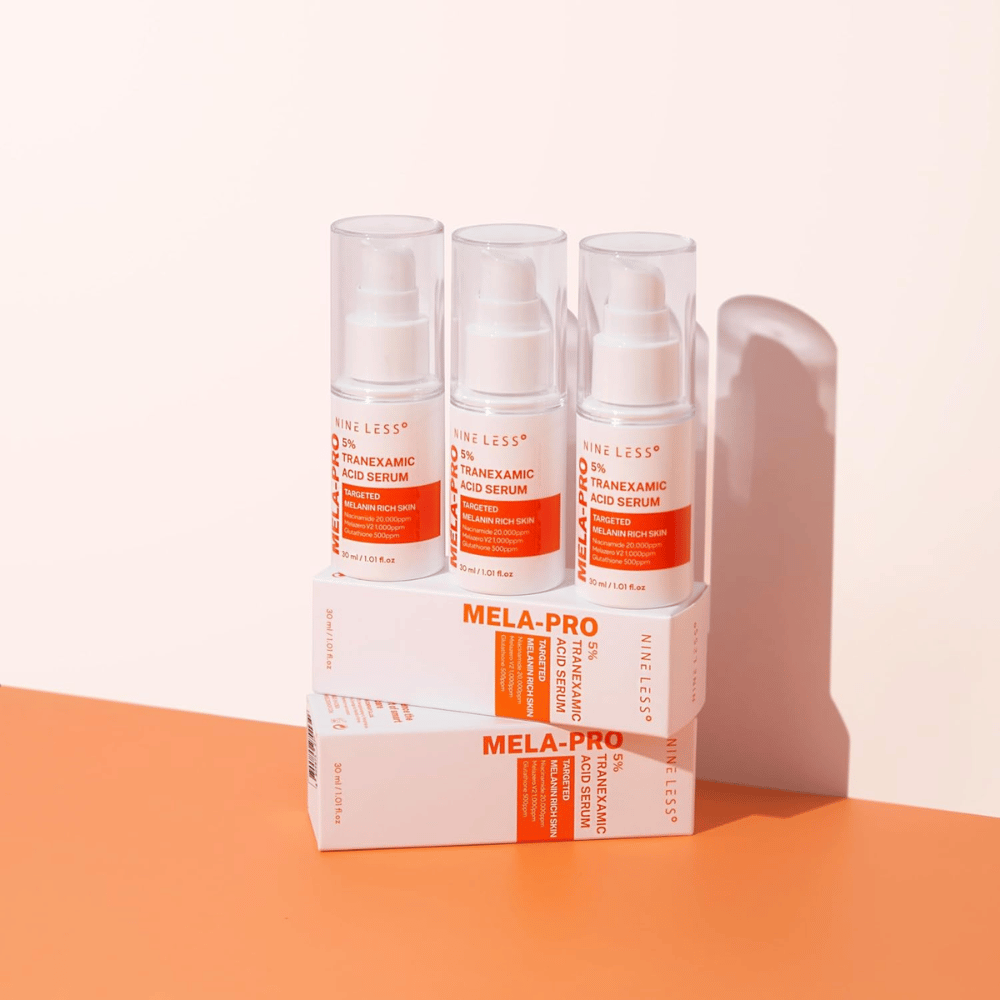 Drei NINE LESS MELA-PRO 5% Tranexamic Acid Serum 30 ml, aufhellendes Serum mit Niacinamid und Glutathion für melaninreiche Haut.