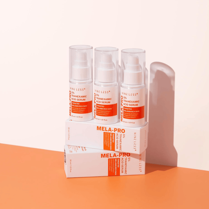 Drei NINE LESS MELA-PRO 5% Tranexamic Acid Serum 30 ml, aufhellendes Serum mit Niacinamid und Glutathion für melaninreiche Haut.