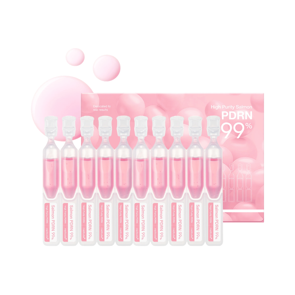 Medicube PDRN Pink One Day Serum Set mit zehn einzelnen Ampullen und Produktverpackung. Das Set enthält ein Serum mit 99 % hochgereinigtem Lachs-PDRN für Feuchtigkeit, Ausstrahlung und die tägliche Hautpflege.
