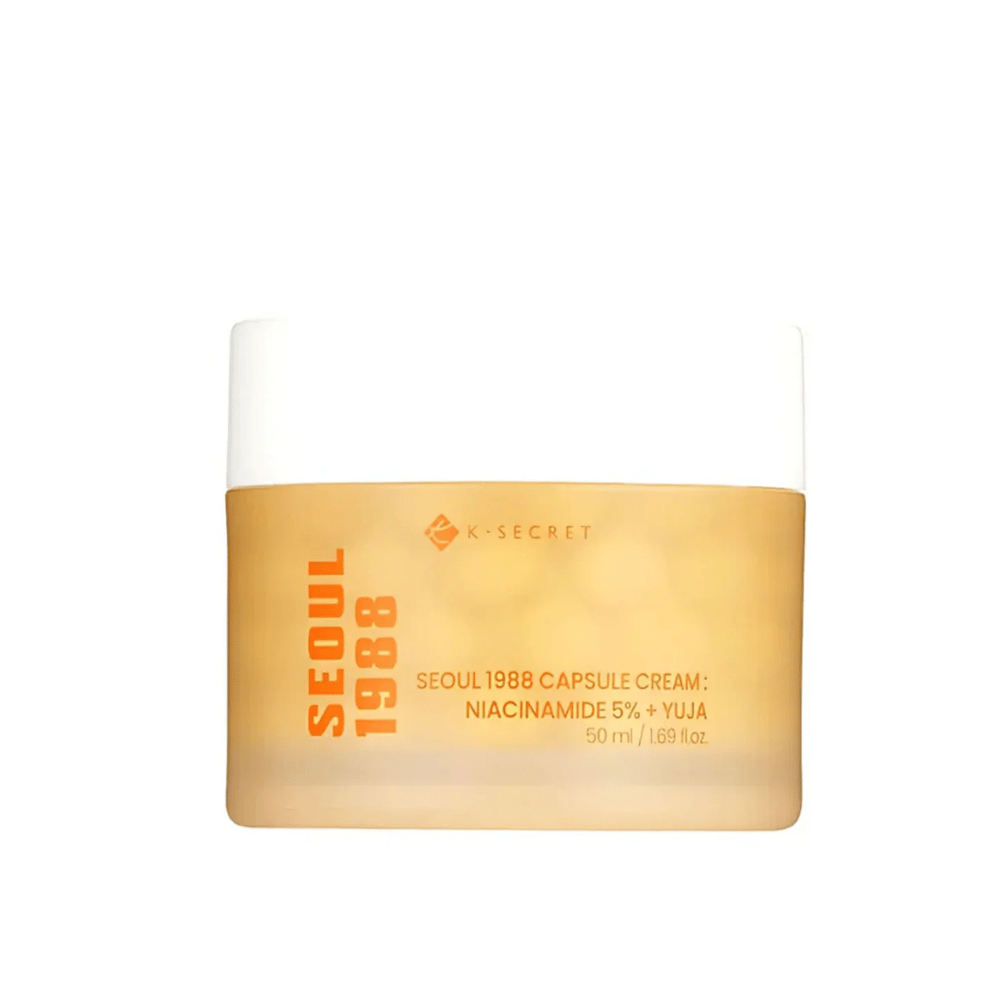 Dose mit K-Secret Seoul 1988 Capsule Cream Niacinamide 5% + Yuja, 50 ml, in goldfarbenem designtem Verpackung.
