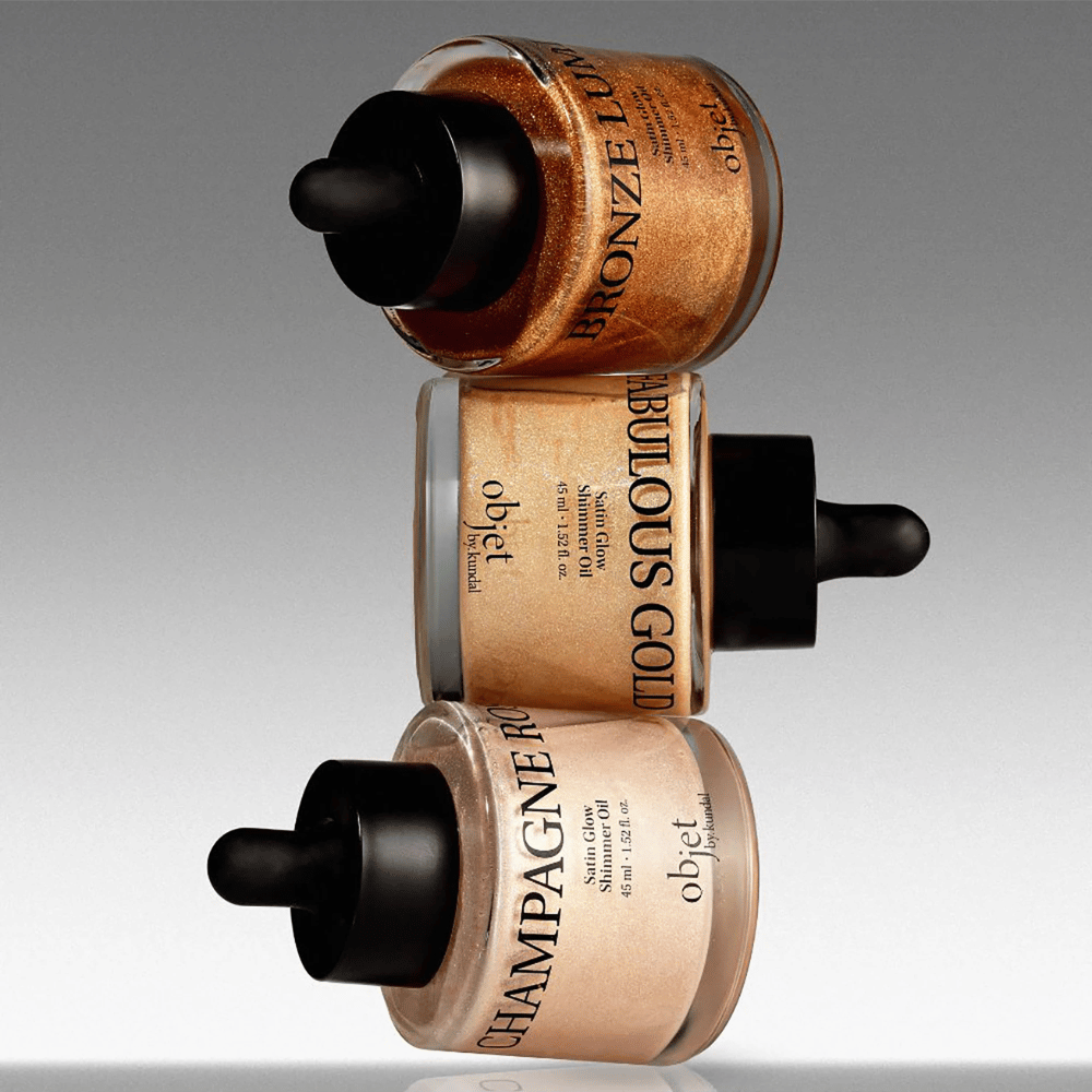 Objet by KUNDAL Satin Glow Shimmer Oil in Bronze Lumière, Fabulous Gold und Champagne Rose – schimmernde Körperöle mit leuchtkraftverleihendem Finish.
