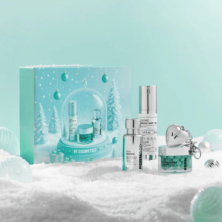 Geschenkverpackung von VT Cosmetics mit Produkten der PDRN-Serie im weihnachtlichen Schneekugel-Design – perfekt als Geschenk.