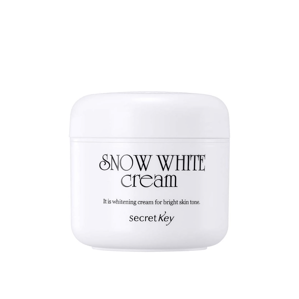 Produktbild von Secret Key Snow White Cream in weißer Dose mit schwarzem Text vor weißem Hintergrund.