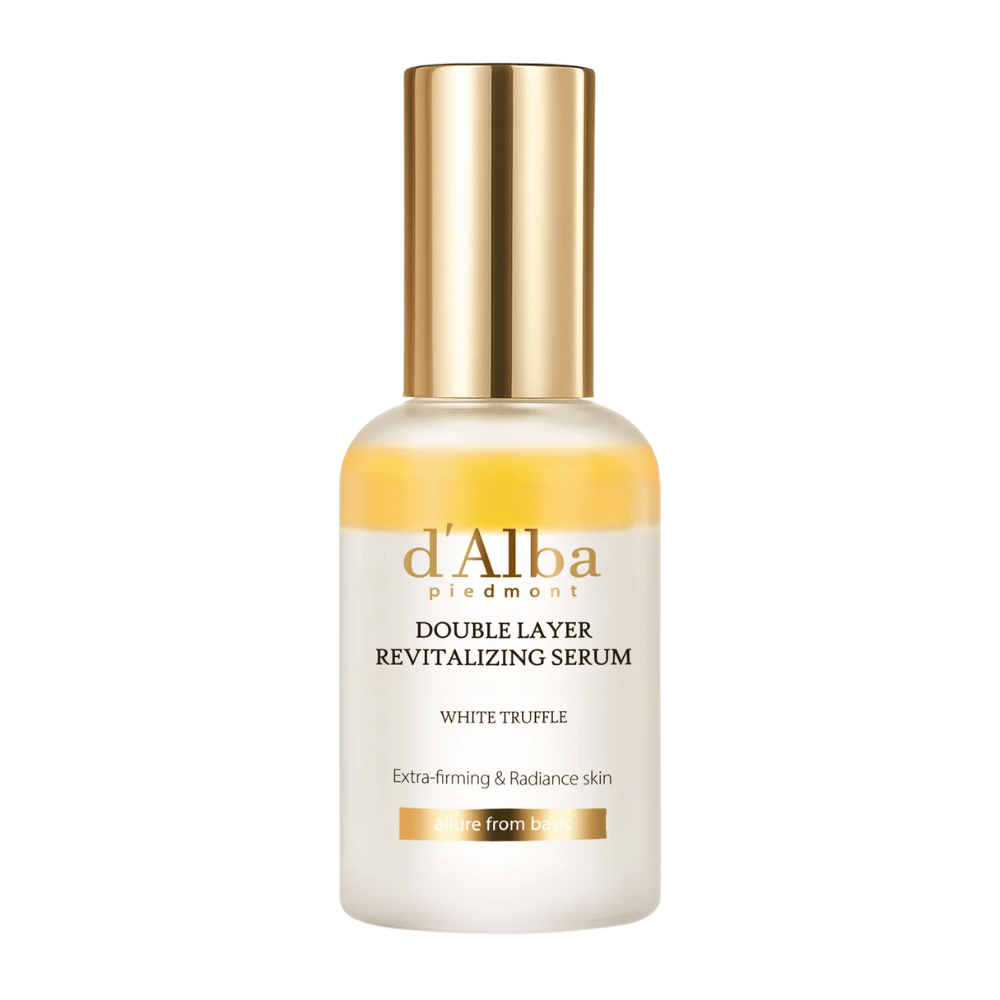 Frilagd bild av d'Alba Double Layer Revitalizing Serum White Truffle i glasflaska med gul topp och guldkork, hudvårdsserum för spänst och lyster.
